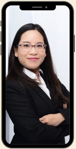 Joy in a black blazer, displayed in a phone frame