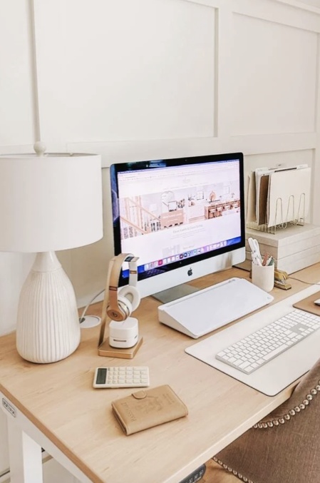 A desktop computer and digital product workspace
